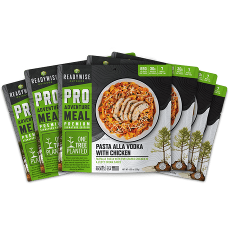 Outdoor adventure meal: farfalle pasta, pan-seared chicken, creamy sauce. Supports reforestation with One Tree Planted.